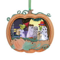 Pumpkin ornament with ghostly Halloween scene inside